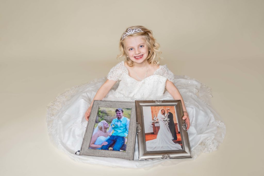 Daughter wearing mother's repurposed wedding dress